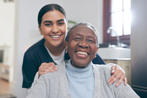 Nursing Aide with patient smiling at camera