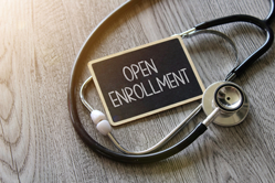 Open Enrollment Sign with Stethescope on top