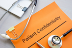 Patient Confidential folder with Stethescope on top